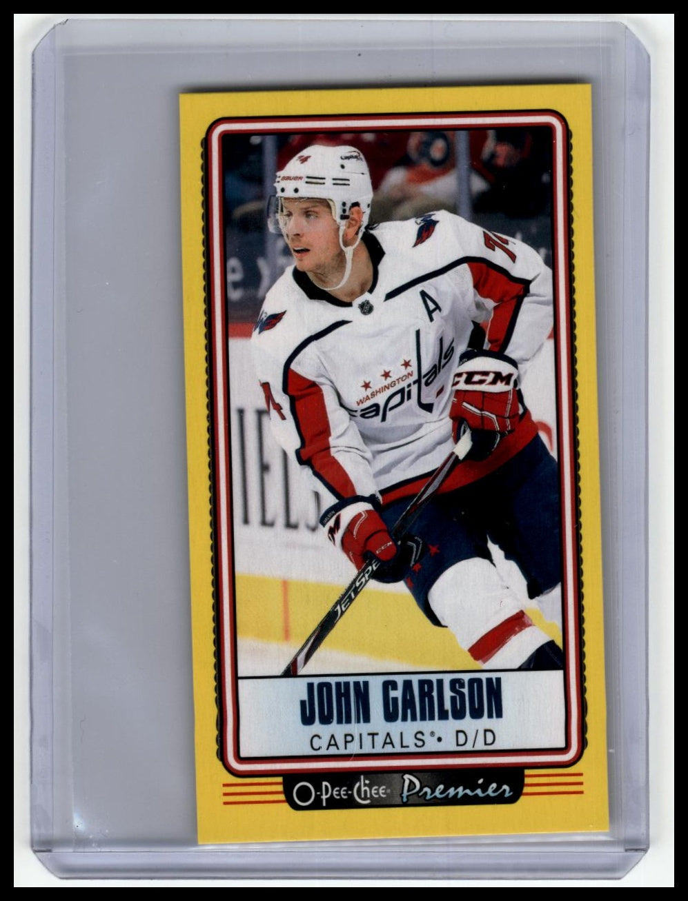 2021-22 O-Pee-Chee #P-15 John Carlson O-Pee-Chee Premier Tallboys Yellow Border